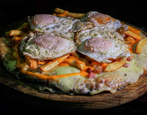 Pizzeta 30 cm con muzza + 4 gustos