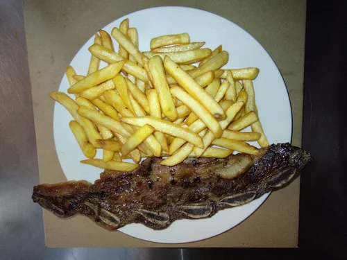 Asado feed lot con guarnición